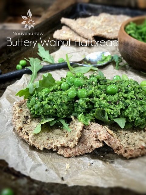 raw vegan gluten-free Buttery Walnut Flatbread with Pea pesto on top