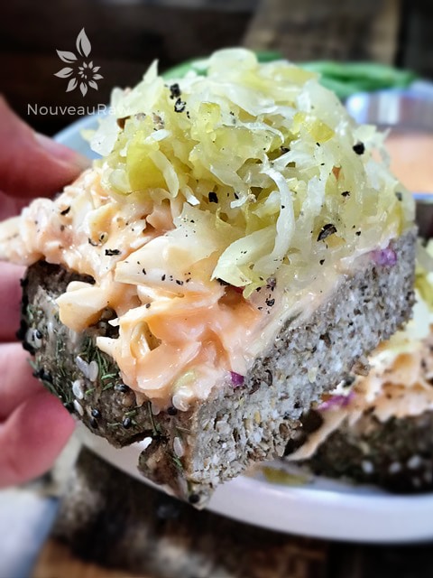 a close up of raw vegan Reuben Sandwich