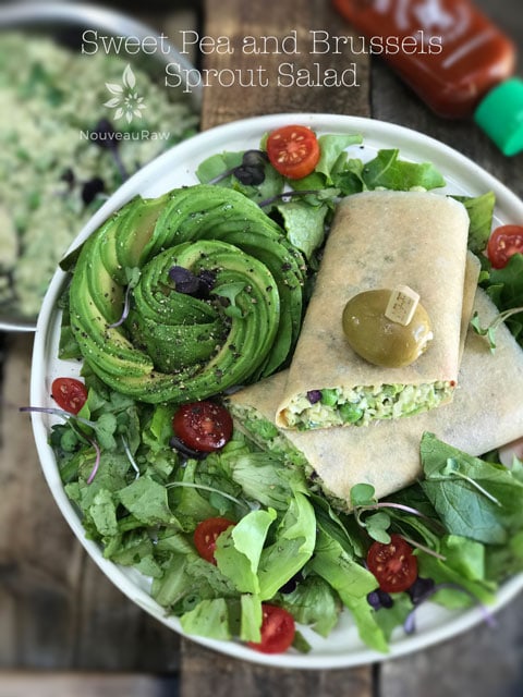 raw vegan Sweet Pea and Brussels Sprout Salad in a coconut wrap