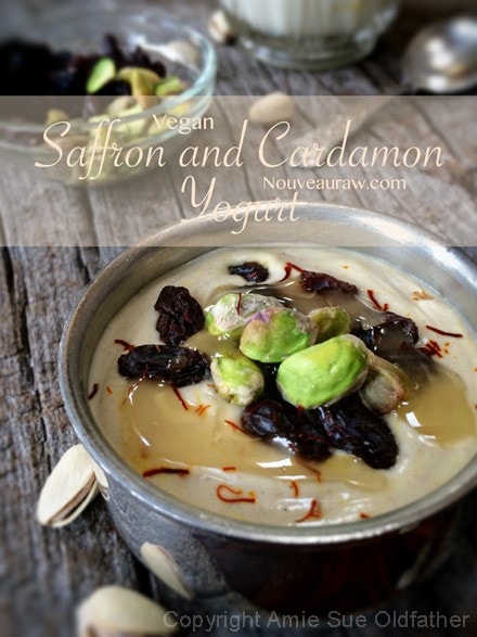 A bowl of Full Flavor Raw Saffron and Cardamon Yogurt with Raw honey Raisins Pistachios on top