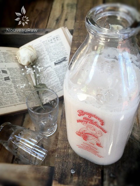 raw vegan raw vegan Sweet Georgian Pecan Homogenized Milk displayed in an antique milk bottle for Christmas