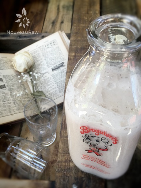 raw vegan raw vegan Sweet Georgian Pecan Homogenized Milk displayed in an antique milk bottle