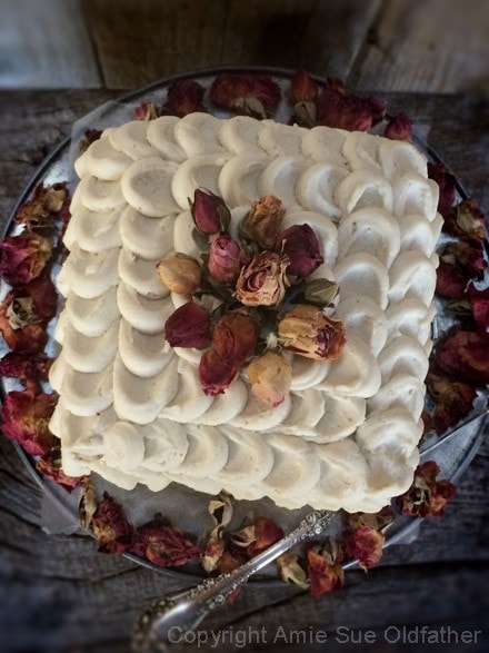 Gorgeous & Delicious Raw Gluten-Free Vegan Five Layer Petal Cake decorated with organic dried rose petals