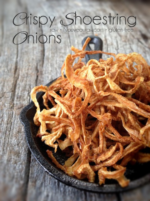 Crispy Shoestring Onions displayed in a cast iron pan