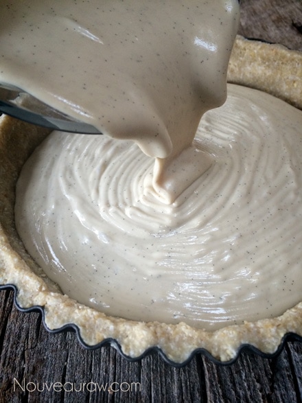 Pour the silky vanilla bean filling into the pie pan