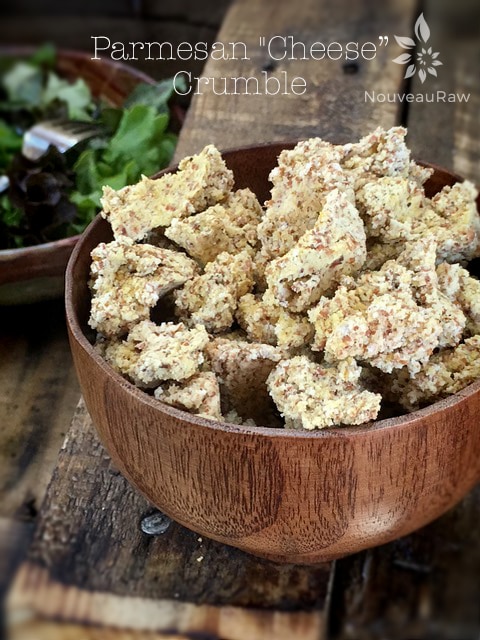 Parmesan "Cheese” Crumble -nut pulp based- served in a wooden bowl