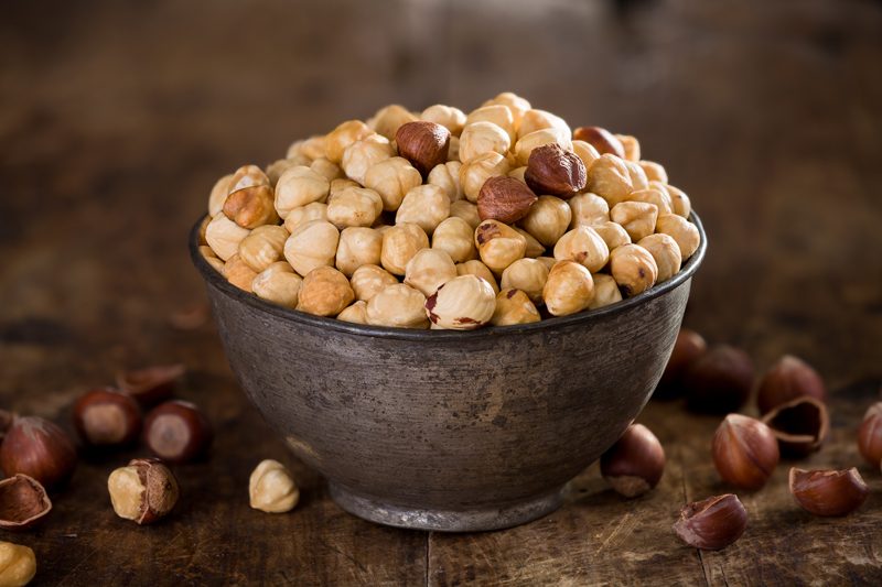 raw hazelnuts in bowl