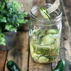 Jalapeño-and-Fennel-Infused-Pickles served in a mason jar