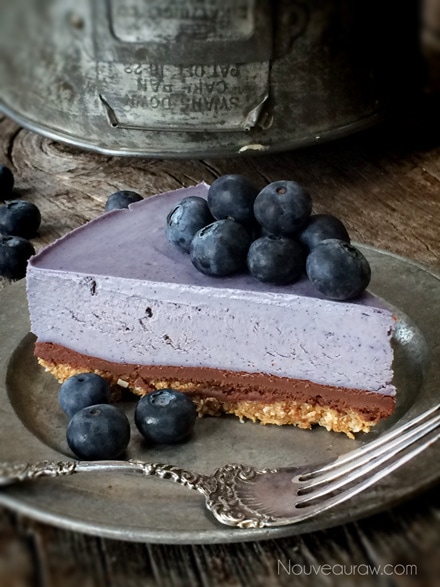 Most amazing purplish color Cheesecake topped with fresh blueberries, ready to enjoy