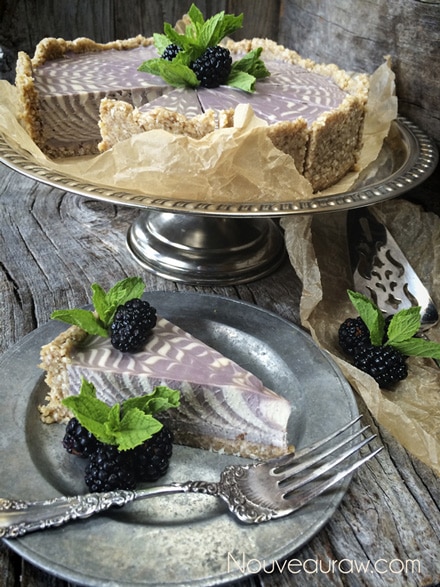  Raw vegan Vanilla Bean and Blackberry Zebra Swirl Cheesecake ready to be served