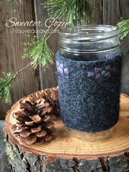 a wool sweater sleeve used to make a jar cozy 