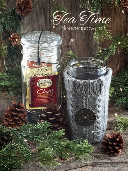 a close up of gray sweater cozy's made from recycled sweaters with a jar of tea bags