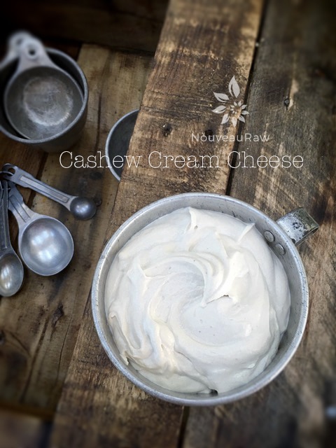 raw vegan Cashew Cream Cheese displayed with antique dishes