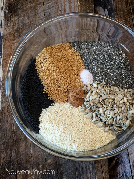 mixing all the ingredients together to make raw vegan grain free Multi-Seeded Crackers