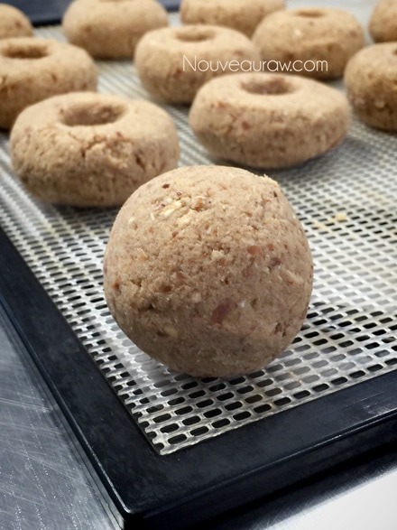shaping the raw vegan gluten-free Old Fashioned Apple Spiced Doughnuts 