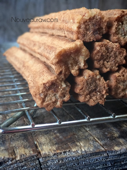 a close up of my raw vegan gluten free Churro Pastries with Chocolate Dipping Sauce