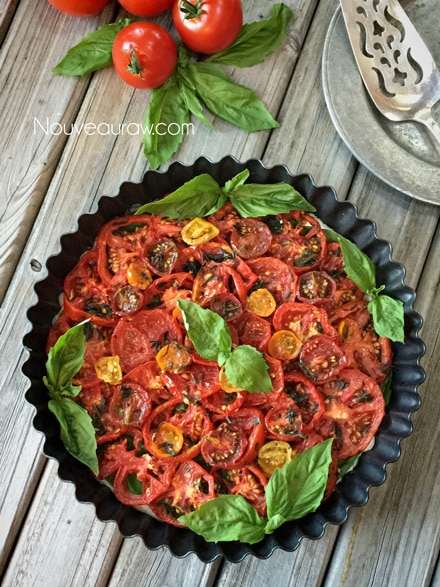raw vegan 'Caprese' Herb and Tomato Tart ready to be eaten