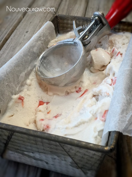 a close up of raw dairy free Salted Watermelon Ice Cream served in a old bread loaf pan