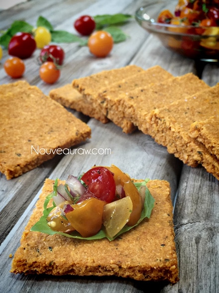 a close view of the Tomato Herbed Crackers with diced cherry tomatoes on top