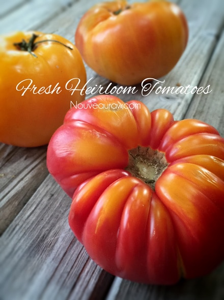 fresh-heirloom-tomatoes on a wooden table