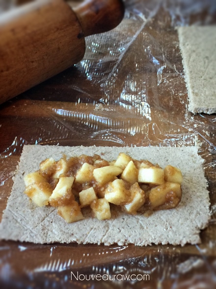 Place roughly 2 Tbsp of apple pie mix in down the center of the crust