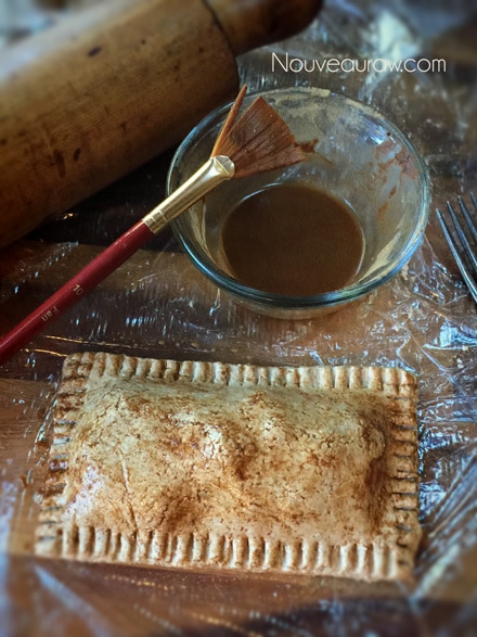 With a craft paint brush, brush the wash over the top of the pastry with cinnamon and water, ready to go dehydrator