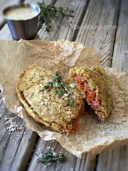 over head shot raw vegan Italian Pizza Pockets displayed on the wooden table