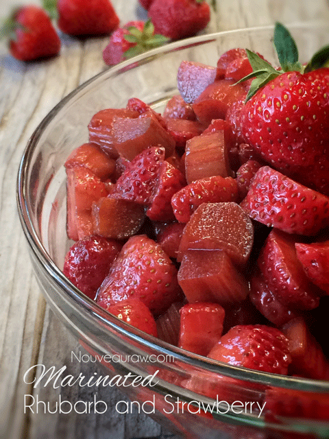 raw vegan Marinated Rhubarb and Strawberries in a glass bowl