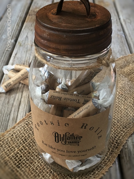Tootsie Rollz displayed in a mason jar with a rustic lid