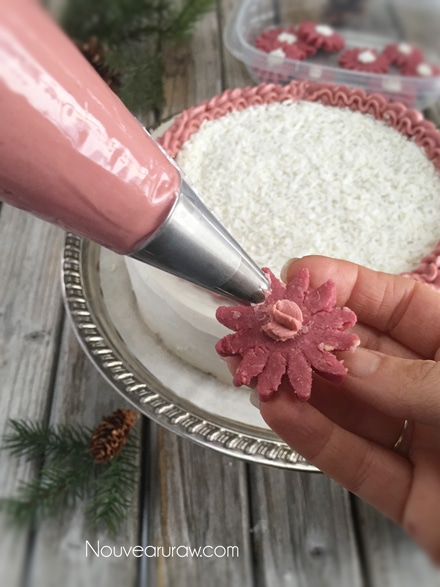 adding cookies for decorations to the vegan, gluten-free Ruby Red Velvet Cake