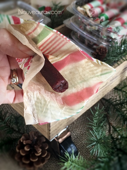 unwrapping Peppermint Tootsie Chews to eat