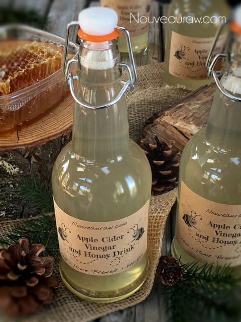 alkalizing Apple Cider Vinegar and Honey Drink in bottles