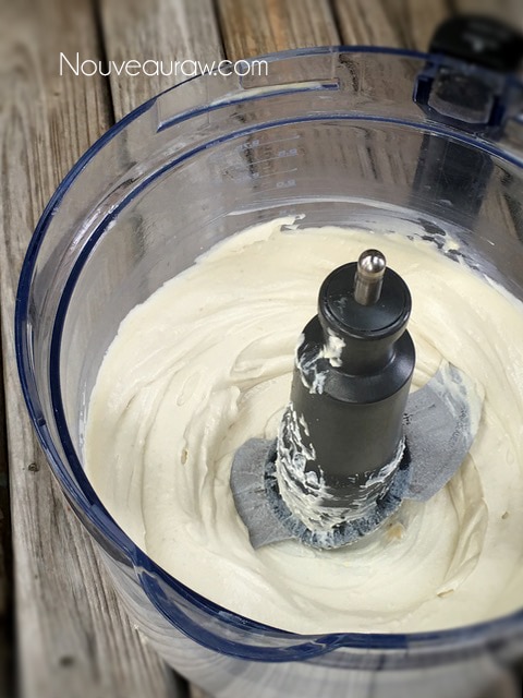 blending Cultured Cashew Cream Cheese in a food processor