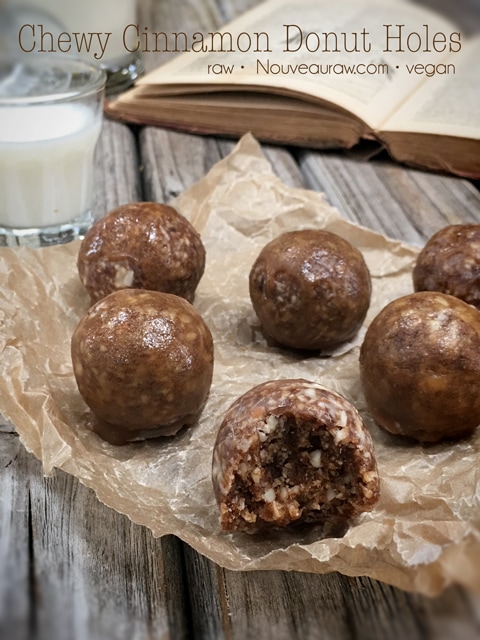 raw vegan gluten-free Chewy Cinnamon Donut Holes displayed on brown parchment paper