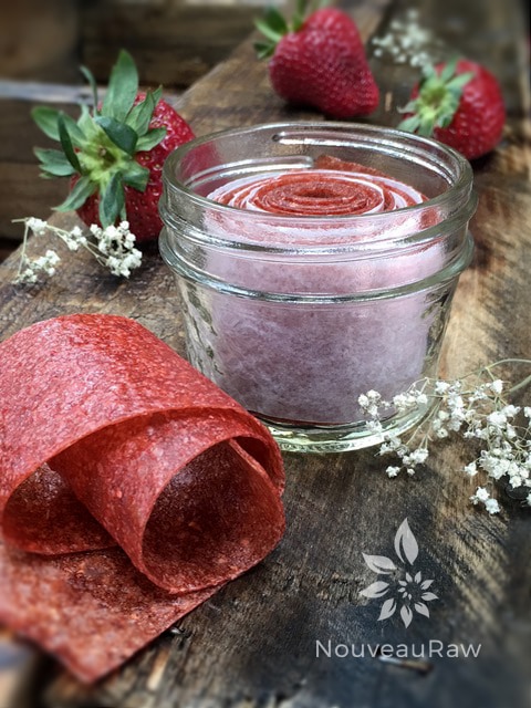 Closeup of Raw Rolled Strawberry Rhubarb Fruit Leather in a Mason Jar