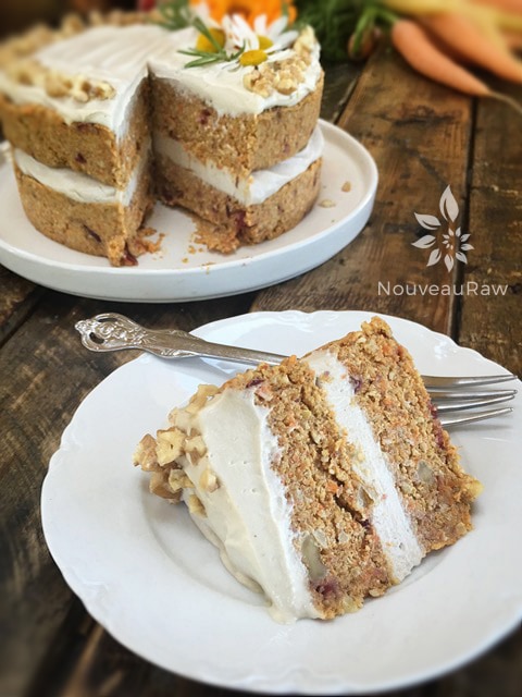 serving up a slice of raw vegan gluten-free Rosemary Cranberry Carrot Cake 