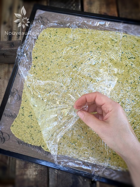 rolling out the batter of the raw vegan Thai Crackers