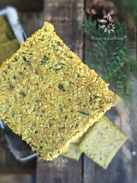 a close up of the raw vegan Thai Crackers displayed on a wooden table