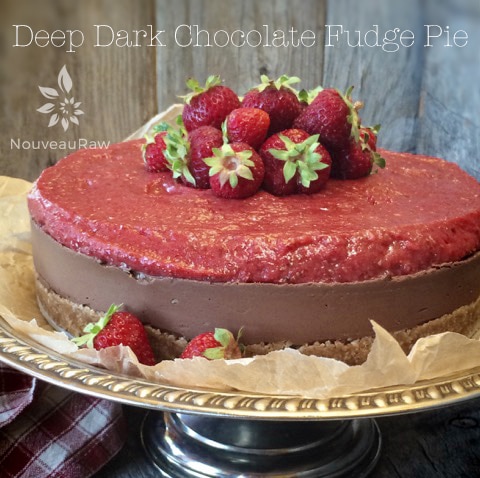 a close up of raw vegan gluten-free Deep Dark Chocolate Fudge Pie on a silver tray