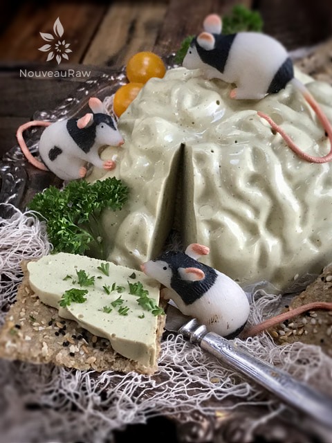 vegan Head Cheese served with cute rubber mice for a Halloween prop