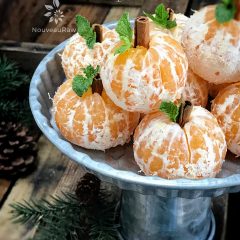 Spooktacular Orange Fruit Pumpkins displayed on a silver tray for Halloween