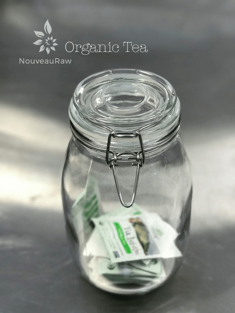 a jar holding green tea
