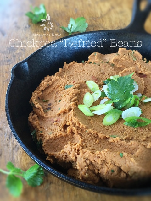 raw vegan Chickpea “Refried” Beans served in a cast iron skillet