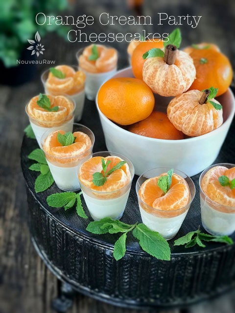 Orange Cream Party Cheesecakes served on an antique cake stand