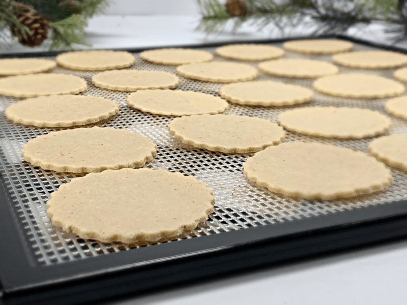 raw vegan Old Fashion Sugar Cookies Wisps on dehydrator tray